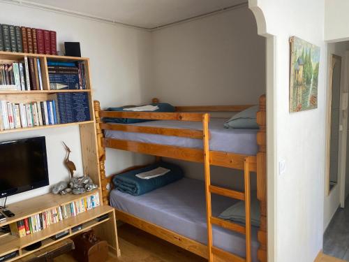 Ένα ή περισσότερα κρεβάτια σε δωμάτιο στο WEEK END à DIEPPE!