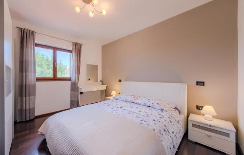 Postel nebo postele na pokoji v ubytování Apartments Villa YoYo