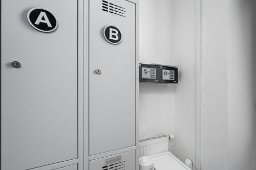 a bathroom with a mirror and a toilet in it at Wellness Hostel Central in Prague