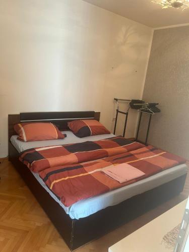 Postel nebo postele na pokoji v ubytování Wing apartman