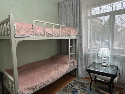 Ένα ή περισσότερα κρεβάτια σε δωμάτιο στο Sunny Hostel Mongolia