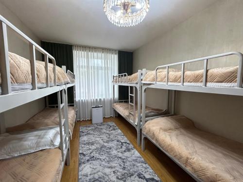 Ένα ή περισσότερα κρεβάτια σε δωμάτιο στο Sunny Hostel Mongolia