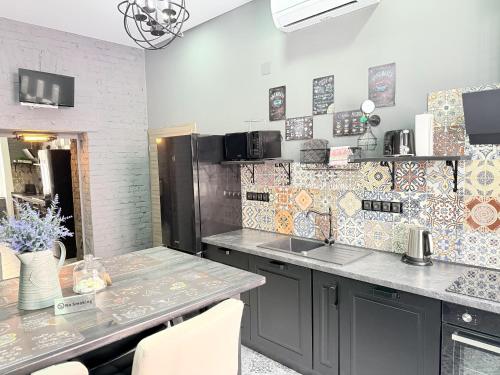 Una cocina o zona de cocina en Residence IRON CUBE