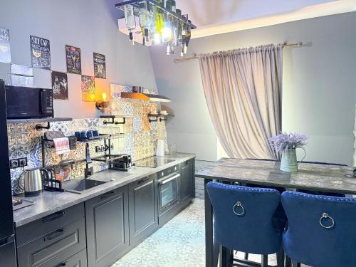 Una cocina o zona de cocina en Residence IRON CUBE