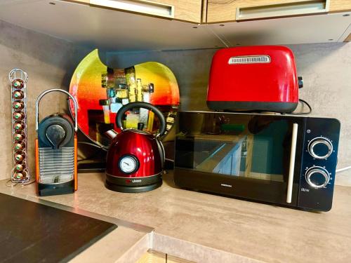 SolgneにあるSolgneのキッチン(トースター、電子レンジ付)