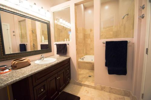a bathroom with a sink and a shower at Amazing Penthouse Skyline Views! in Chicago
