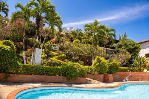 Hotel Campestre Casona del Camino Realの敷地内または近くにあるプール