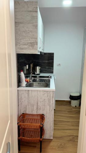 Køkken eller tekøkken på Eri Rooms