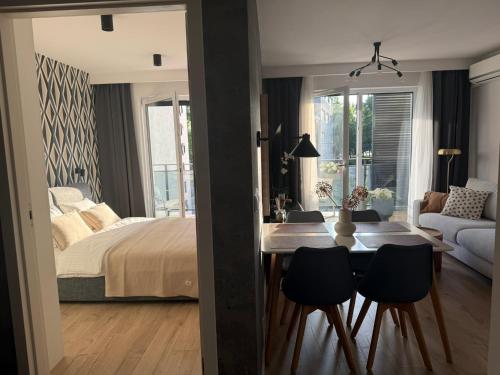 Ένα ή περισσότερα κρεβάτια σε δωμάτιο στο Apartament Centro z bezpłatnym garażem