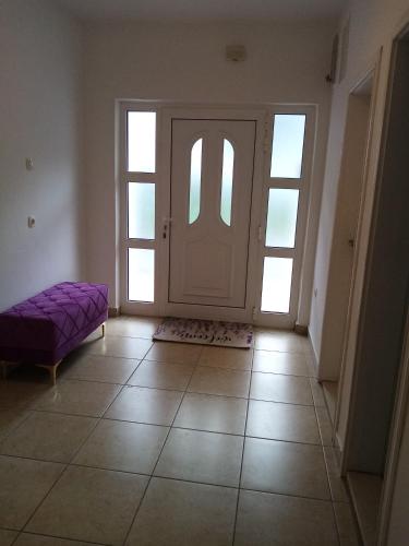 Postel nebo postele na pokoji v ubytování Apartments Suzana