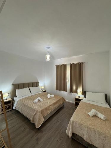 Ein Bett oder Betten in einem Zimmer der Unterkunft Serenity Guesthouse