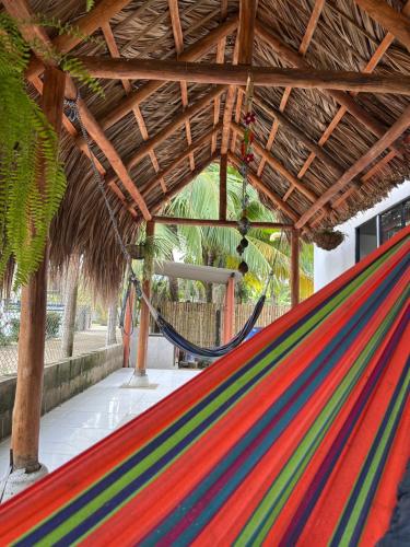 Afbeelding uit fotogalerij van Cabaña con piscina privada in Necoclí