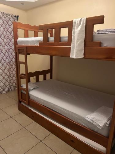 a bedroom with two bunk beds in a room at Quinta Don Noé in San Mateo