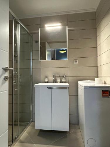 Ένα μπάνιο στο Ljubičica deluxe 2, sa dvorištem i parkingom