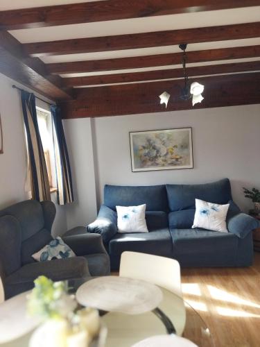 Ruang duduk di Apartamentos Caloca
