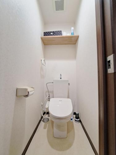 a bathroom with a white toilet in a room at 2 minutes from Oyama station, 2 beds in Oyama