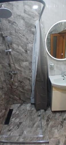 Ein Badezimmer in der Unterkunft Hotel SLY