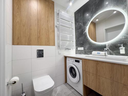 Ένα μπάνιο στο Apartamenty Na Klifie Q4 Apartments