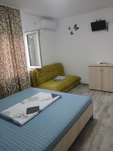Postel nebo postele na pokoji v ubytování Casa Cristian