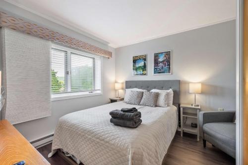 a bedroom with a bed with a pillow on it at Cozy 1 Bedroom Condo Holiday Valley in Ellicottville