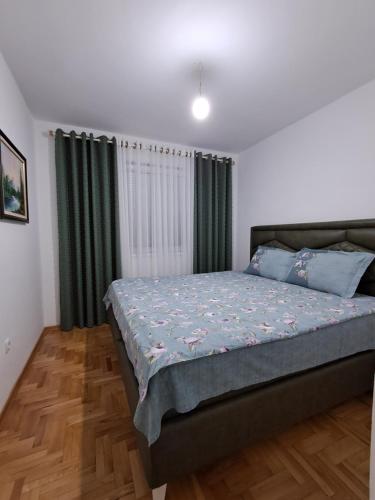 Postel nebo postele na pokoji v ubytování Apartman PETRA QUEEN