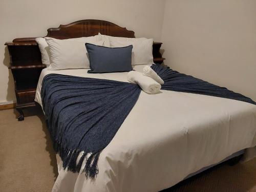 Postel nebo postele na pokoji v ubytování NEW LODGE - Westdene