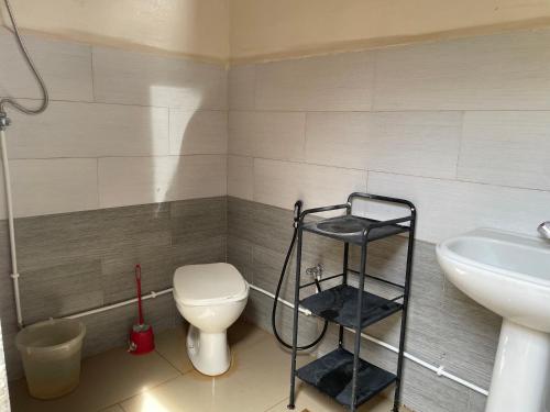 Koupelna v ubytování Bungalow avec piscine