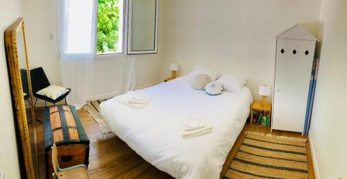 Llit o llits en una habitació de Villa Oasis