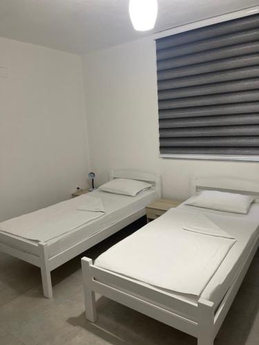 Postel nebo postele na pokoji v ubytování Villa Goldlux