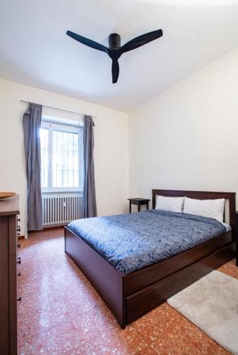A bed or beds in a room at Entire home/apt in Milan near Fairs and Navigli