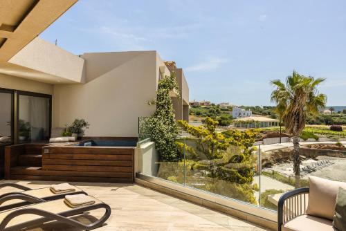 a view from the balcony of a house at Alas Resort & Spa in Elia Laconias