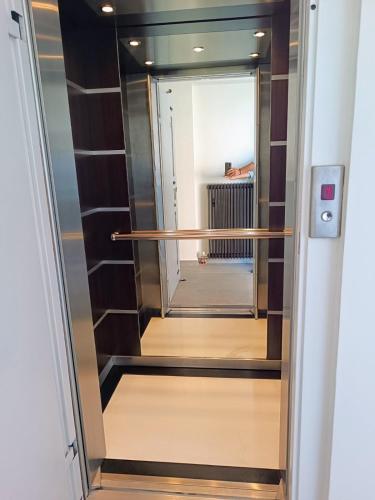 a walk in closet with a glass door at "Naias"seaside residence in the port of Piraeus-entire holiday home in Piraeus