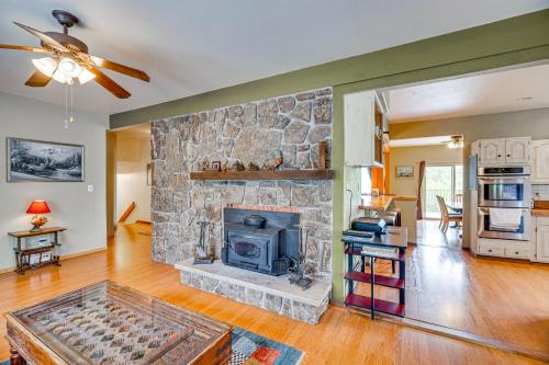 a living room with a stone fireplace at Breweries, Hiking Trails and Museums Monument House in Monument