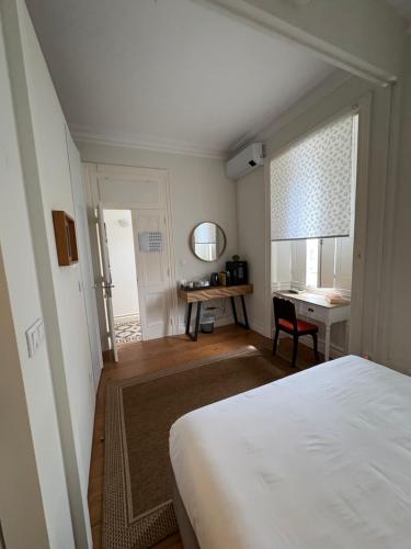 Ένα ή περισσότερα κρεβάτια σε δωμάτιο στο In53 Guest House