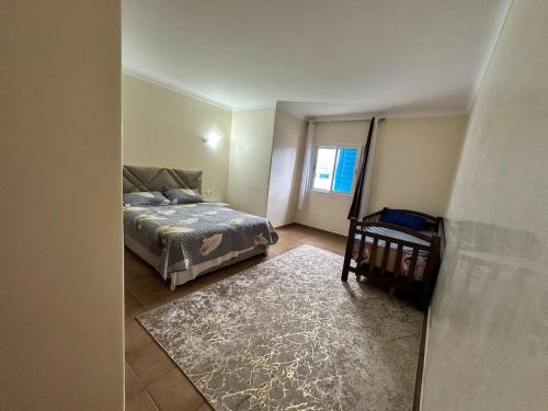 Ein Bett oder Betten in einem Zimmer der Unterkunft 213 mdiq Appartement parfait à louer à kabila vista 2 chambre salon piscine 2 balcon 90 mètres carré