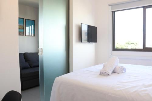 Postel nebo postele na pokoji v ubytování Lindo apartamento em Ondina - Salvador