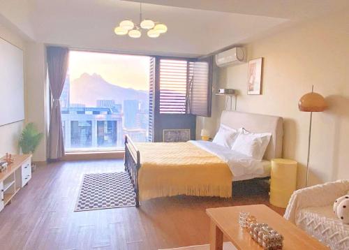 Katil atau katil-katil dalam bilik di Azure Haven Seaview Suites Shilaoren Coast