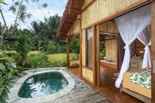 Bazén v ubytování Nava Prana Villas by GenuineHost nebo v jeho okolí