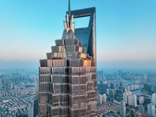 a view of a skyscraper in a city at Grand Hyatt Shanghai in Shanghai