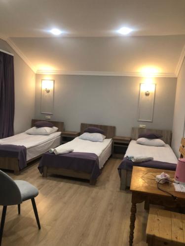 Ein Bett oder Betten in einem Zimmer der Unterkunft Guest House Anahit Ijevan