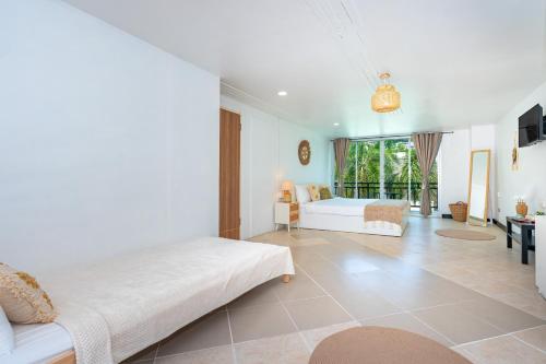Kata Station Boutique Hotelにあるベッド