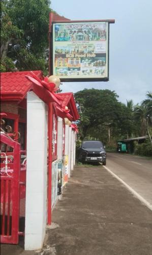 a car parked on the side of a road at ECB Guest House in Siquijor