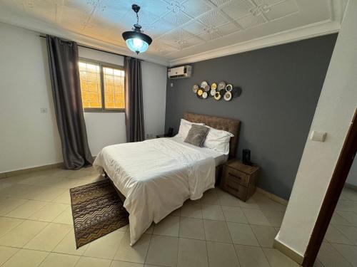 Postel nebo postele na pokoji v ubytování Jos Home appartement Cozy à bastos