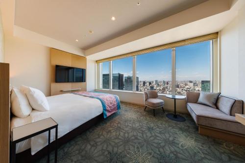 TV a/nebo společenská místnost v ubytování Hotel Metropolitan Tokyo Marunouchi