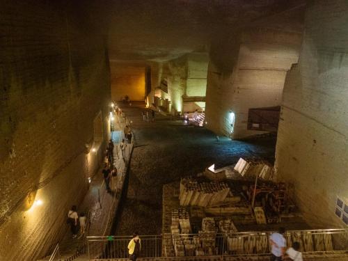 a group of people walking through a tunnel at night at Center - Vacation STAY 18175v in Kanuma