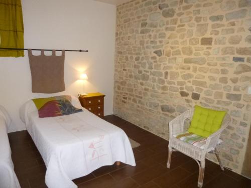 Ένα ή περισσότερα κρεβάτια σε δωμάτιο στο Chambres d'Hôtes de Céline et David
