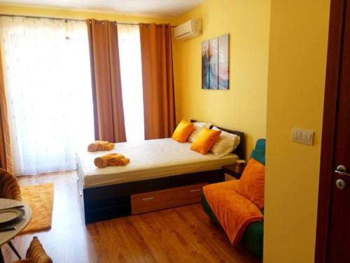 Ένα ή περισσότερα κρεβάτια σε δωμάτιο στο One-room boutique at Sunrise All Suites