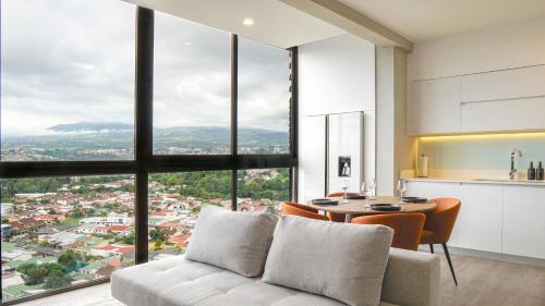 Χώρος καθιστικού στο Zen Urbano View of the Irazu Volcano con Jacuzzi and AC