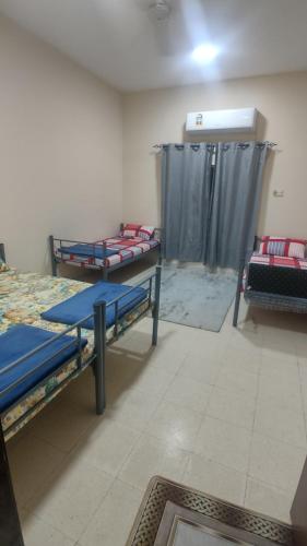 Postel nebo postele na pokoji v ubytování Gulf Gateway Hostel