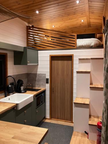 Kuchyň nebo kuchyňský kout v ubytování Au sentier de Verlaine - Tiny House à Paliseul